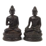 Two cast metal figures of Buddha, possibly Thai or from Nepal, the largest 13cm high