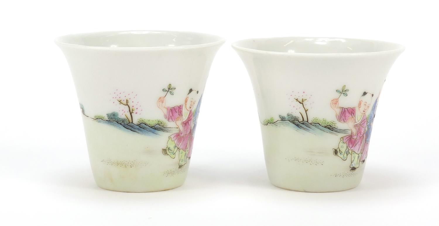 Good pair of Chinese porcelain tea cups hand painted in the famille rose palette with children - Image 6 of 11