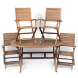 Teak folding garden table and four chairs, the table 76cm H x 147cm W x 91 D, the chairs each 94cm H