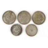 Five Chinese silver coloured metal coins