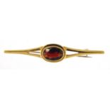 18ct gold cabochon garnet bar brooch, 6cm wide, 4.8g