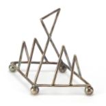 Silver plated toast rack in the manner of Christopher Dresser, Numbered 1965, 10cm high