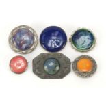 Six Arts & Crafts circular cabochons housed in silver/ embossed pewter brooch mounts including one