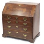 Georgian style mahogany bureau, the fall enclosing a fitted interior above four graduated drawers,