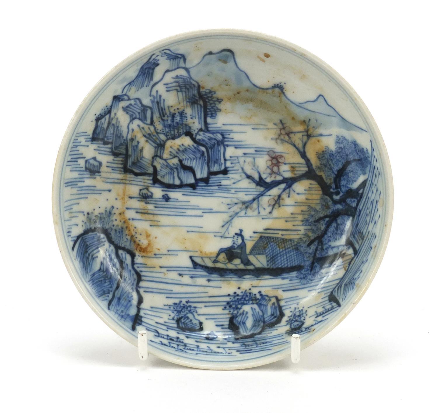 Chinese blue and white porcelain shallow dish hand painted with fishermen in a mountain landscape,