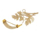 Antique unmarked gold claw brooch and a seed pearl floral brooch with unmarked gold pin, 5.5cm and