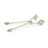 Johan Rohde for Georg Jensen, pair of Danish silver acorn pattern sugar nips, London import marks