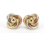 Pair of 9ct three tone gold stud earrings, 1.2cm in diameter, 1.6g