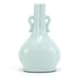 Chinese celadon glaze porcelain vase with twin handles, six figure Qianlong character marks to the
