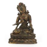 Chino-Tibetan gilt bronze figure of Buddha inset with jewels, impressed character marks to the