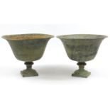 Pair of verdigris bronzed urn planters, each 32cm high x 40cm in diameter