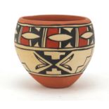 Jemez Pueblo, Native American pottery vase, hand painted with a stylised design, signed to the base,