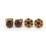 Two pairs of 9ct gold garnet stud earrings, 9mm and 7mm in diameter, 3.8g