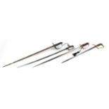 Four 19th century military interest swords including two with wire bound shagreen grips and one by