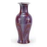 Chinese porcelain baluster vase having a sang de boeuf glaze, 30cm high
