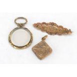 Victorian gold coloured metal brooch and two lockets, the brooch 4.2cm wide, 12.6g