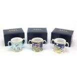 Three Halcyon Days nursery rhyme cups with twin handles and boxes, 7cm high