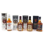 Four bottles of whiskey with boxes comprising two bottles of Chivas Regal aged 12 years and two