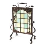 Arts & Crafts wrought iron and copper fruit design firescreen with leaded clear and coloured glass