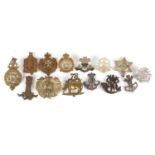 Fourteen military interest cap badges including Queen's Own Oxfordshire Hussars, Duke of