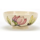 Moorcroft pottery bowl hand painted in the Magnolia pattern, 16.5cm in diameter
