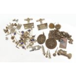 Silver and white metal jewellery including cufflinks, St Christopher pendants, earrings and