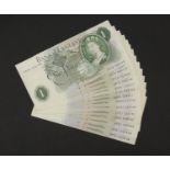 Fourteen Bank of England G B Page one pound notes including three with consecutive serial numbers,