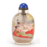 Chinese glass snuff bottle internally hand painted with an erotic scene and bamboo grove, 9.5cm high