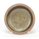 Attributed to Bernard Leach, St Ives Studio pottery dish incised with a hare, 11cm in diameter