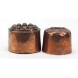 Two 19th century copper jelly moulds, the largest 15cm in diameter