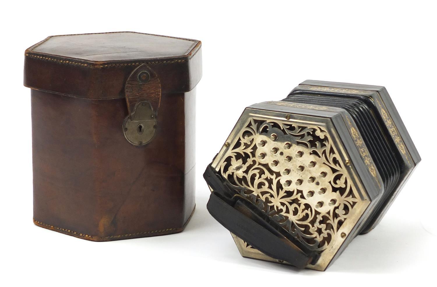 Charles Jeffries, 19th century 39 button concertina with velvet lined case, the concertina having