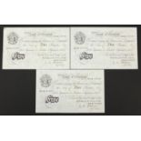 Three 1955 Bank of England white five pound bank notes with consecutive serial numbers and Chief