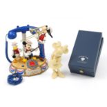 Telemania telephone titled Mickey's Dixieland Band and a Minnie Mouse figure with box, the largest