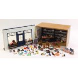 Hand built wooden model doll's house toy shop with contents, 30cm H x 47cm W x 32cm D