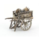 Medusa Oro, Italian miniature silver model of a knife sharpener's cart with moving parts, 6cm in