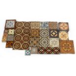 Victorian encaustic tiles including seven by William Godwin, set of eight by Minton and Campbell