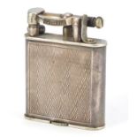 Alfred Dunhill, silver plated pocket lighter with engine turned decoration, 5.1cm high