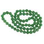 Chinese green jade bead necklace, 80cm in length, 155.0g