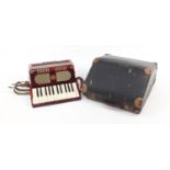 Worldmaster red marbleised accordion with case