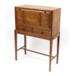 Arts & Crafts oak student's bureau on stand with a fall above two drawers, 109cm H x 79cm W x 33cm D