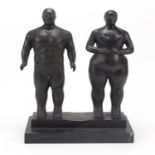 Modernist patinated bronze group of a standing nude male and female in the manner of Fernado Botero,