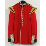 Military interest Grenadier Guards tunic with shoulder titles, label to the interior