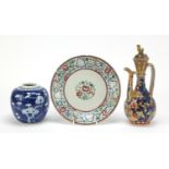 Chinese porcelain comprising a clobbered lidded ewer, famille rose plate and prunus ginger jar,