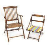 Two Victorian campaign type folding chairs, the largest 84cm high