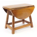 Alan 'Acornman' Grainger, oak drop leaf occasional table carved with signature acorn, 42cm H x