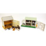 Two vintage wooden and tinplate doll's houses with contents, the largest 56cm wide
