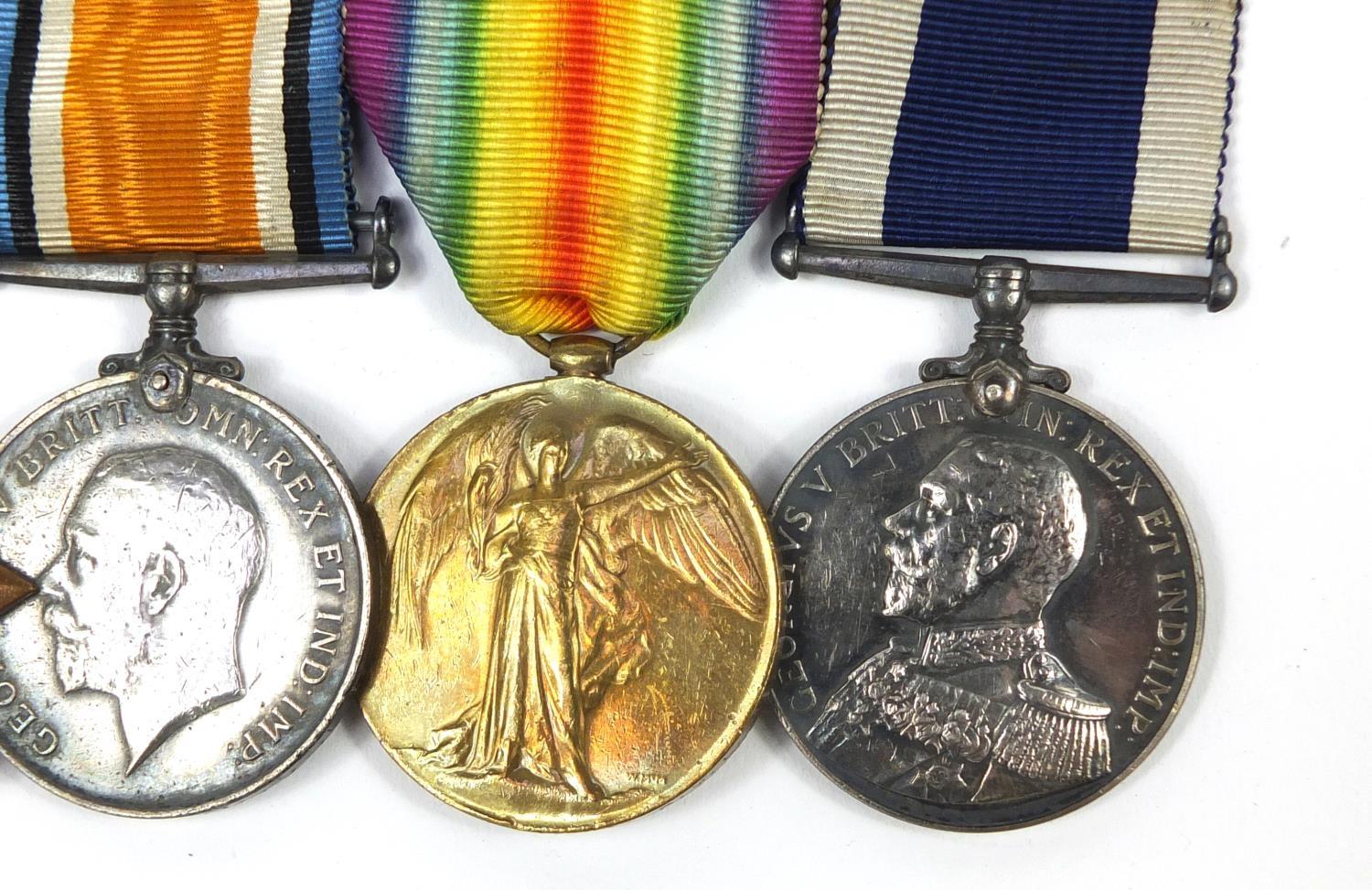 British military World War I naval four medal group comprising a trio awarded to CH.20821.PTE.G. - Image 7 of 11