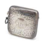 Cohen & Charles, Edward VII silver vesta engraved with flowers and foliage, Chester 1909, 5cm