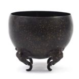 Chinese gold splashed bronze censer with elephant head feet, 23.5cm high x 27cm in diameter