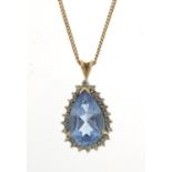 9ct gold blue stone and diamond tear drop pendant on a 9ct gold necklace, 44cm in length, the